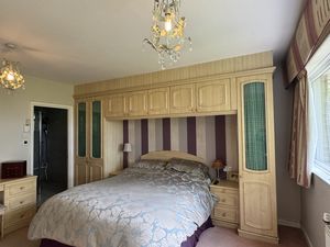 MASTER BEDROOM b- click for photo gallery
